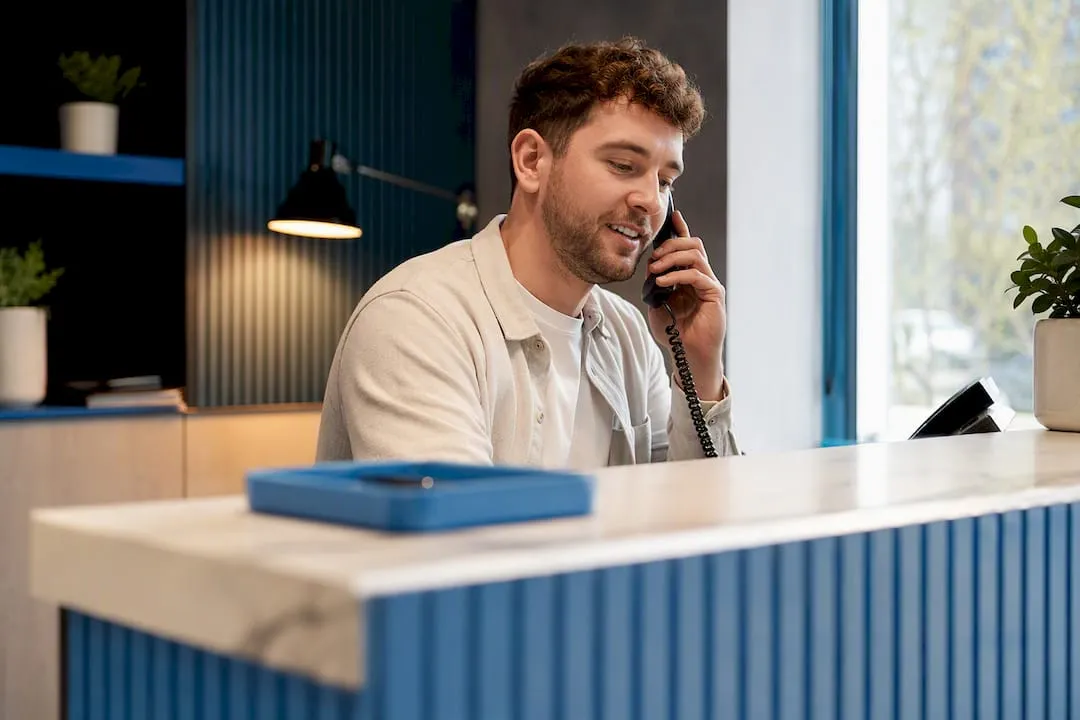 UK business owner answering customer call