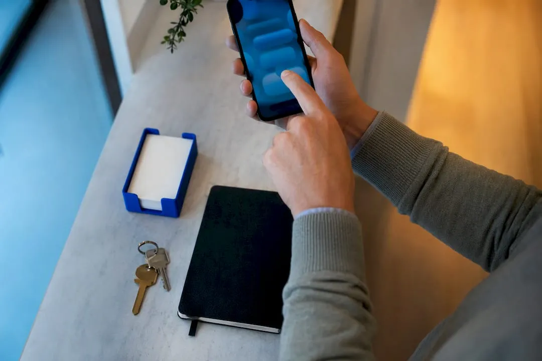 Hand preparing a phone number with extension