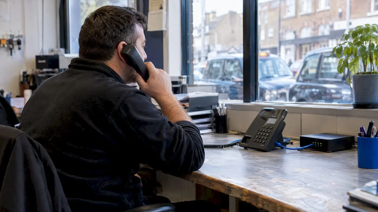 Taxi owner using a virtual phone handset
